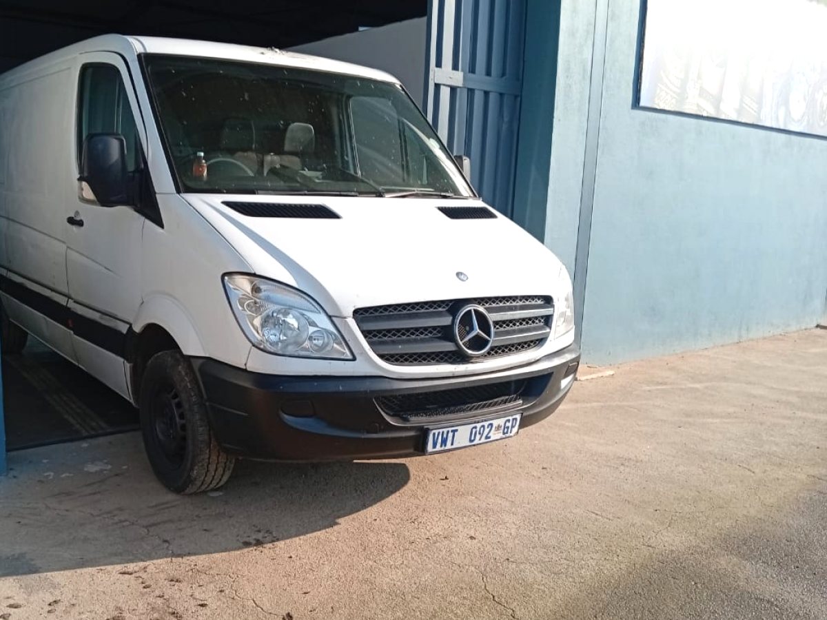 White Mercedes-Benz panel van used for fast cross-border courier deliveries between Eswatini and South Africa